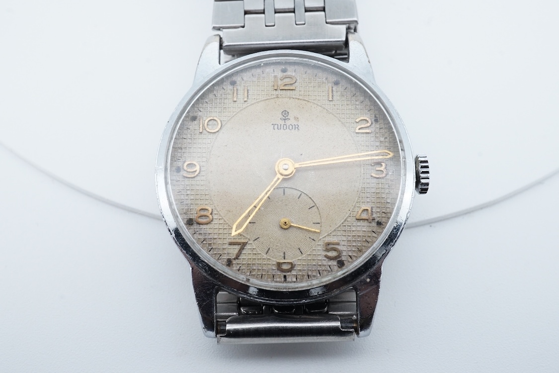 A gentleman's 1950's? steel Tudor manual wind wrist watch, with Arabic dial and subsidiary seconds, ETA movement 1260, case diameter 32mm, on an associated stainless steel strap, no box or papers.